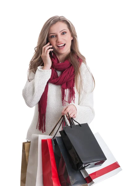 Winkelen meisje praten over de telefoon en handelen verbaasd — Stockfoto