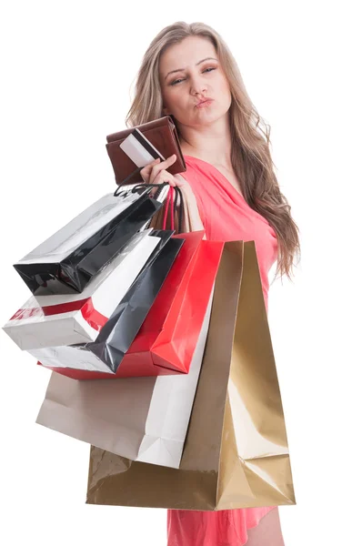 Satisfied shopping lady holding bags, card and wallet — Stock Photo, Image