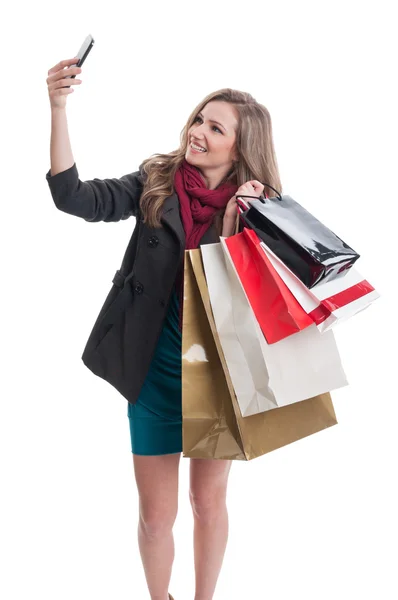 Shopping girl taking a selfie — Stock Photo, Image