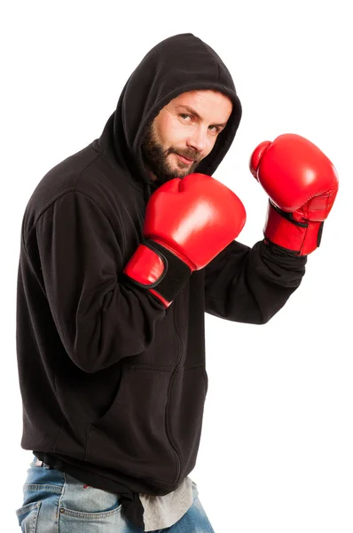 Amateur boxer wearing a hoodie and gloves — Stock Photo, Image