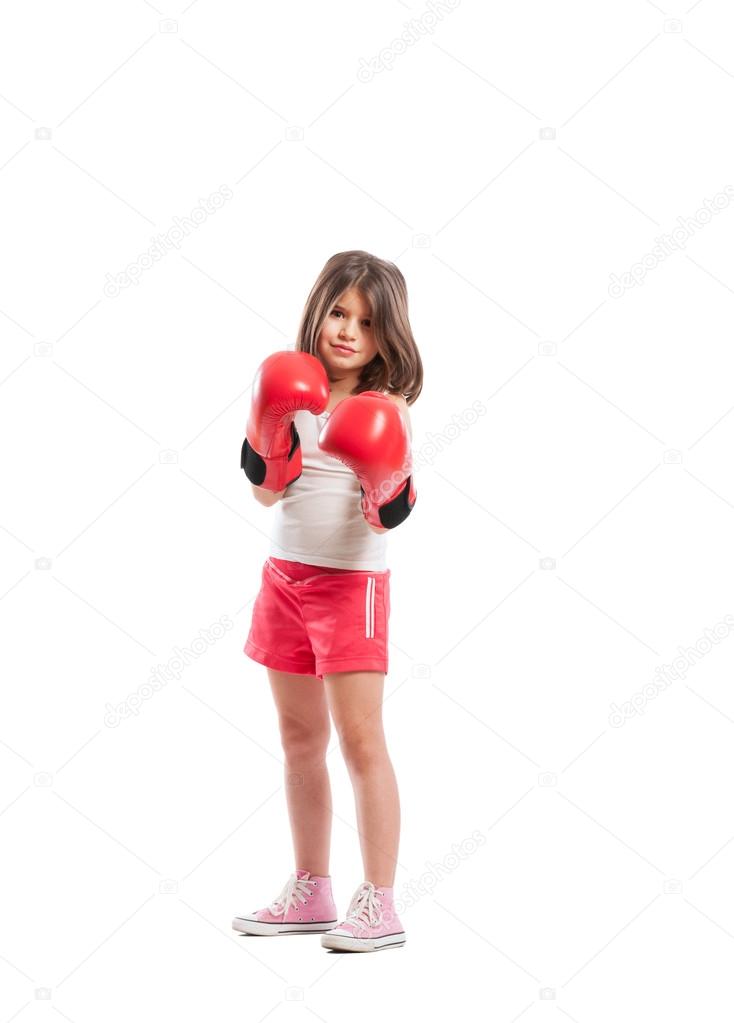 Young boxer girl standing as a fighter
