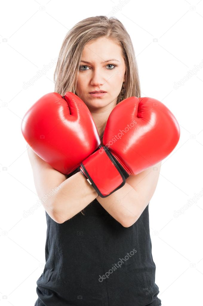 Portrait of a boxer woman crossing the arms