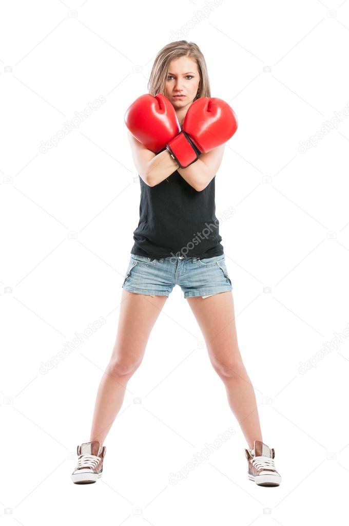 Boxer woman crossing the arms