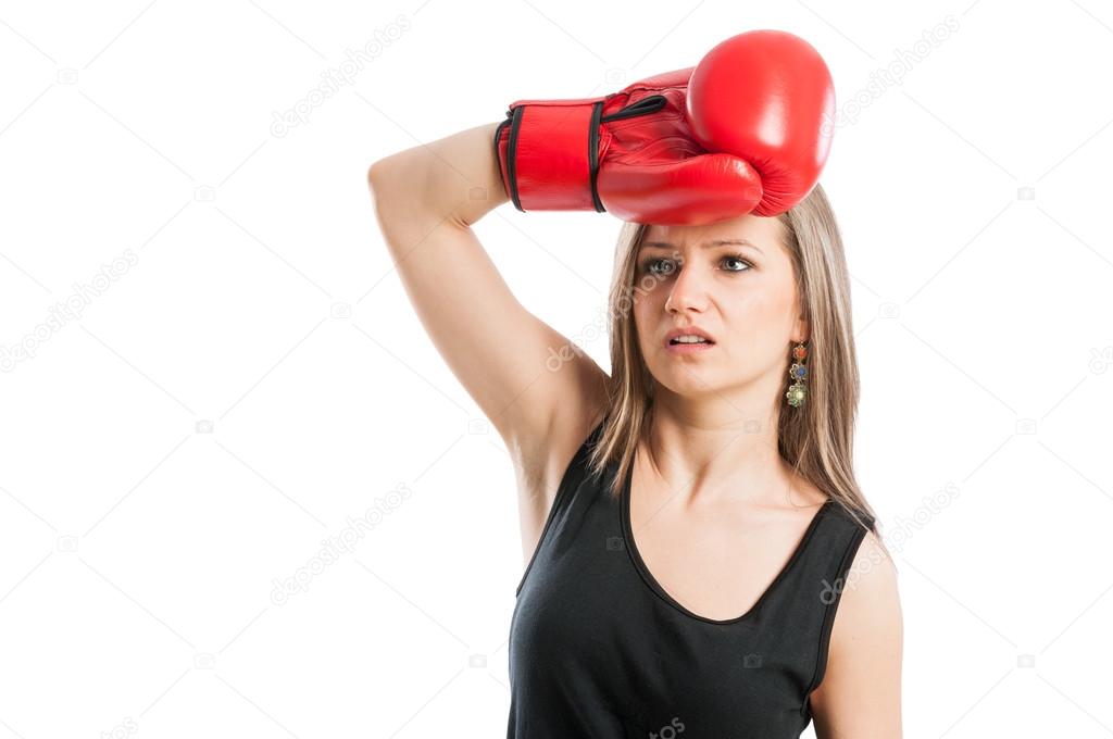 Female boxer feeling tired and exhausted