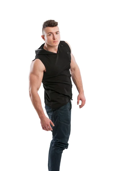 Young man wearing jeans and black hoodie — Stock Photo, Image