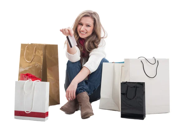 Happy shopping female holding credit or debit card — Stock Photo, Image