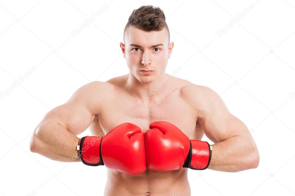 Young, muscular and shirtless boxer