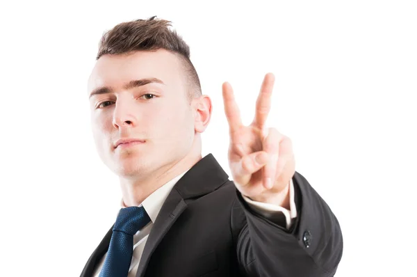 Business man showing peace or victory sign — Stock Photo, Image