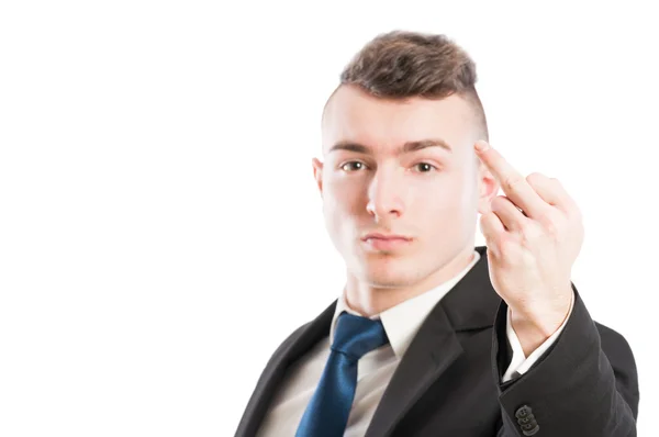 Hombre de negocios mostrando el dedo medio —  Fotos de Stock