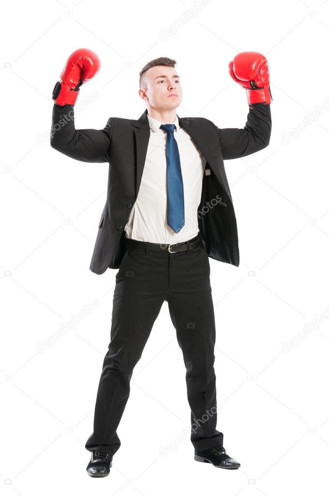 Confident business man acting like a champion