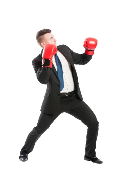 Homem de negócios assustado usando luvas de boxe — Fotografia de Stock