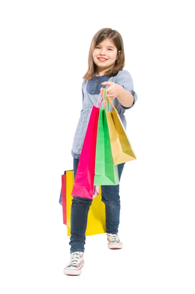 Joven chica de compras caminando — Foto de Stock