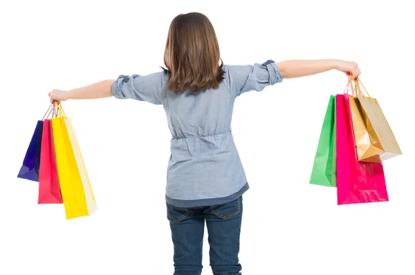 Cute and young shopping girl from behind — Stock Photo, Image