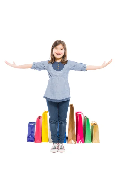 Gelukkig winkelen kind of jong meisje permanent — Stockfoto