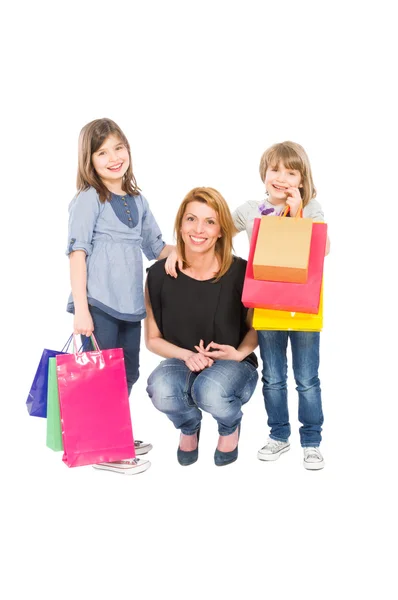 Winkelen vrouw en dochters — Stockfoto