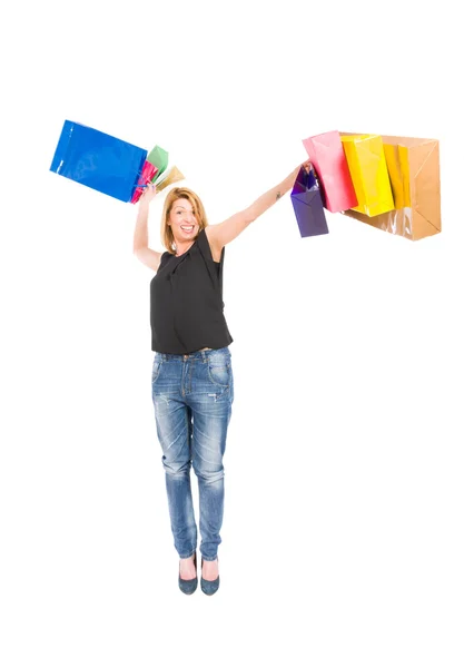 Joyful shopping mujer lanzando bolsas de compras —  Fotos de Stock