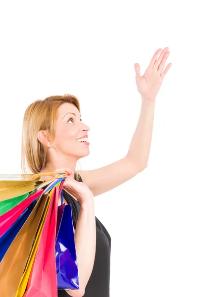 Shopping woman holding hand up — Stock Photo, Image