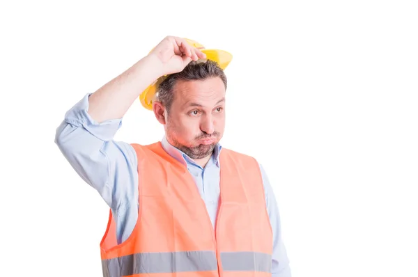 Trabajador o ingeniero sorprendido, cansado o sorprendido — Foto de Stock