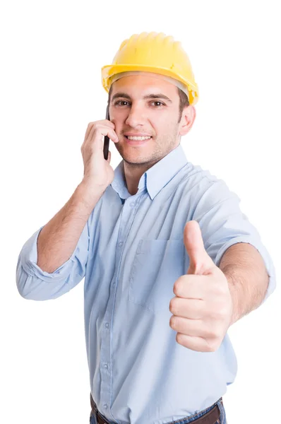 Αυτοπεποίθηση μηχανικός εμφανίζονται αντίχειρα, ενώ μιλάει στο τηλέφωνο — Φωτογραφία Αρχείου