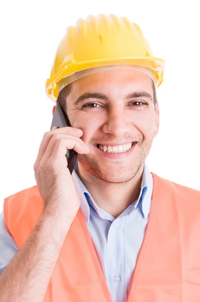 Happy smiling engineer talking on smartphone — Stock Photo, Image