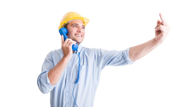 Telefonda konuşurken mühendis gösteren orta parmak — Stok fotoğraf