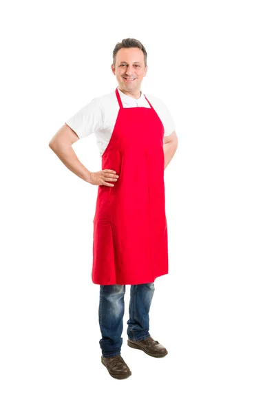 Supermarket employee or butcher with red apron — Stock Photo, Image