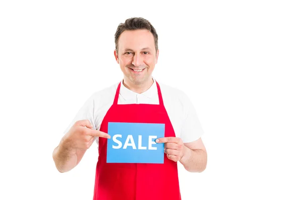 Hypermarket employee or worker holding sale sign — Stock Photo, Image