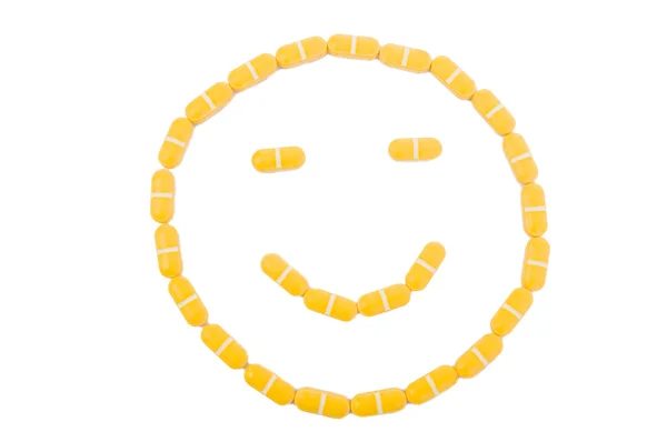 Smiley and friendly face made of pills — Stock Photo, Image