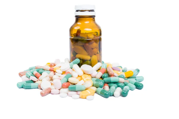 Recipient of medicine and many pills — Stock Photo, Image