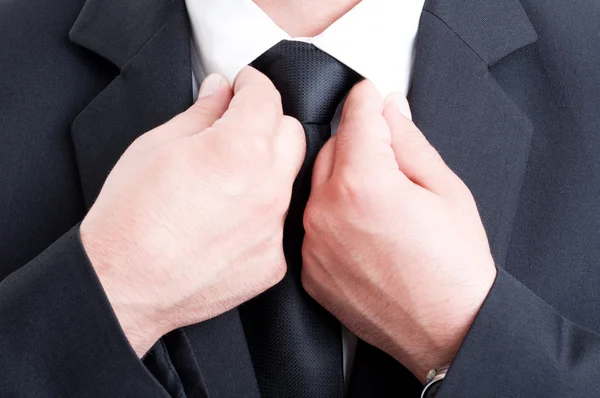 Formal business man fixing white shirt collar — Stock Photo, Image