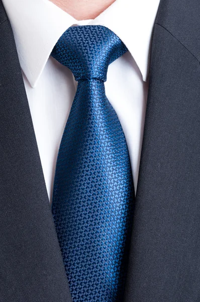 Black suit, white shirt and blue tie — Stock Photo, Image