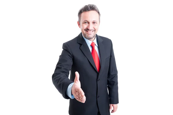 Homem de negócios amigável e confiante pronto para apertar a mão — Fotografia de Stock