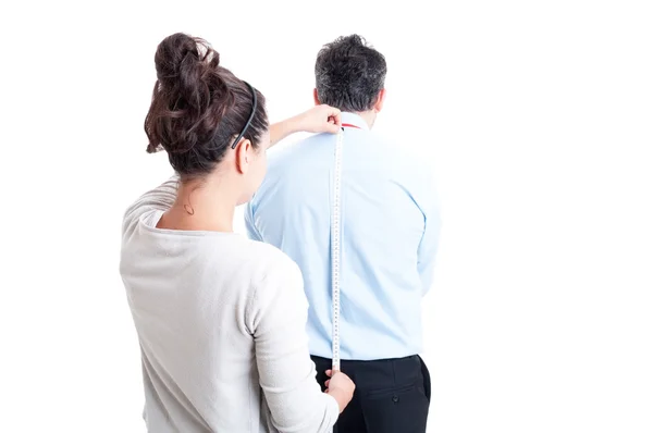 Mujer sastre tomando medidas — Foto de Stock