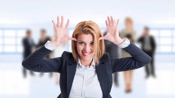 Woman business manager acting funny and childish — Stock Photo, Image