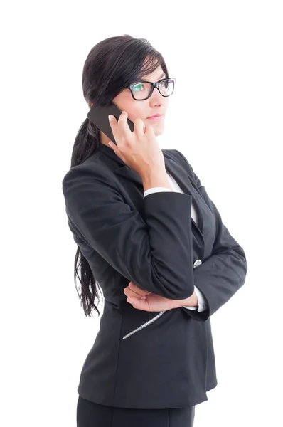 Busy and modern saleswoman talking on smartphone — Stock Photo, Image