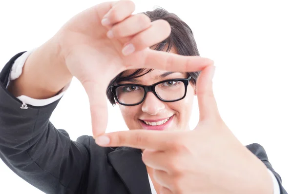 Female business manager framing the face with fingers — Stock Photo, Image