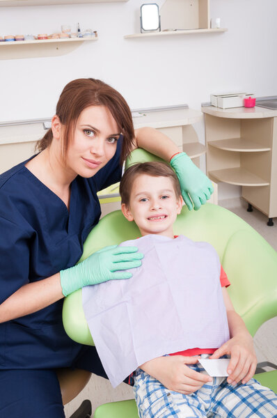 Kid patient smiling in dental office
