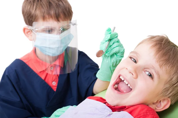 Kids playing as doctor and patient — Stock fotografie