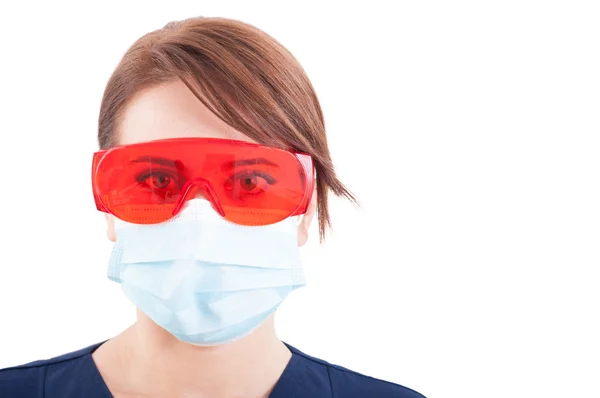 Portrait of dentist woman wearing mask and protective glasses — 스톡 사진