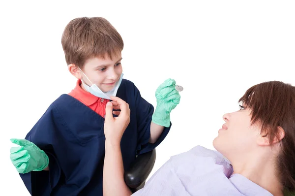 Kid dentist doctor with female patient — Stok fotoğraf