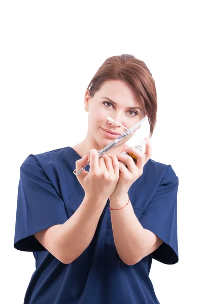 Dentist woman holding syringe and anesthetic — 图库照片