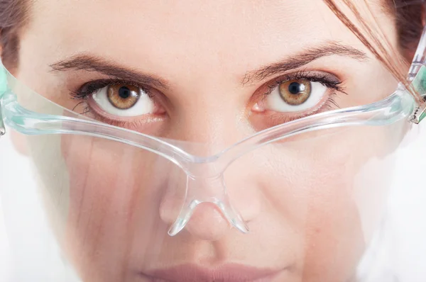 Closeup of eyes of dentist woman — Stock Photo, Image