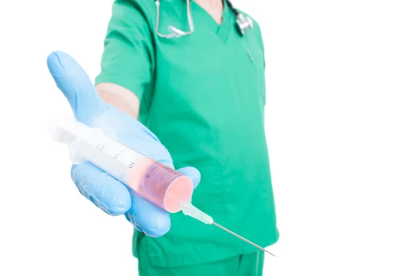 Medic or doctor holding a syringe — Stock Photo, Image