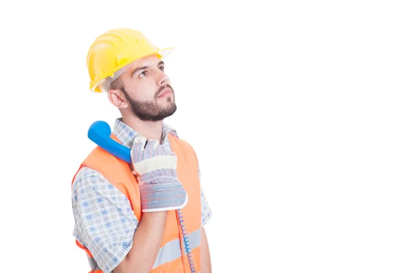 Trabalhador da construção ou construtor segurando telefone — Fotografia de Stock