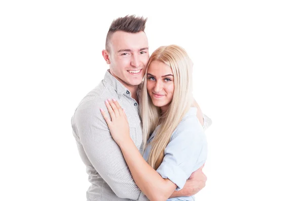 Happy young couple hugging each other — Stock Photo, Image