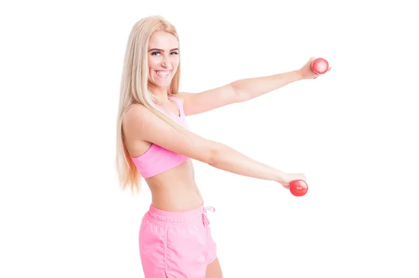 Glücklich lächelnd und schöne Fitness-Mädchen mit Gewichten — Stockfoto