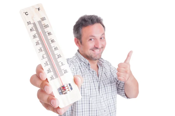 Man holding thermometer and showing like — Stock Photo, Image