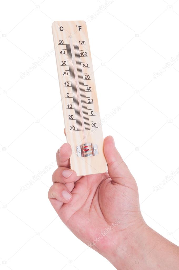 Hand holding thermometer isolated on white