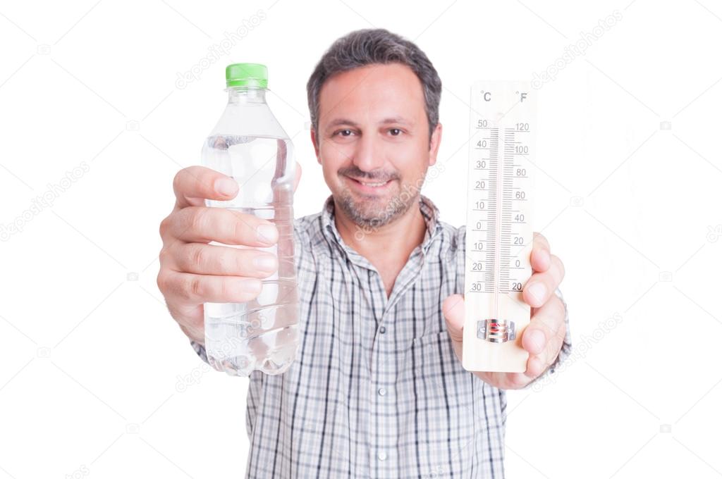 Man holding thermometer and cold water bottle