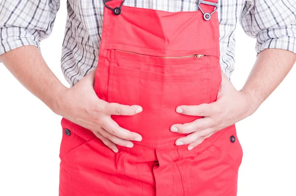 Trabalhador segurando barriga como indigestão ou conceito inchado — Fotografia de Stock